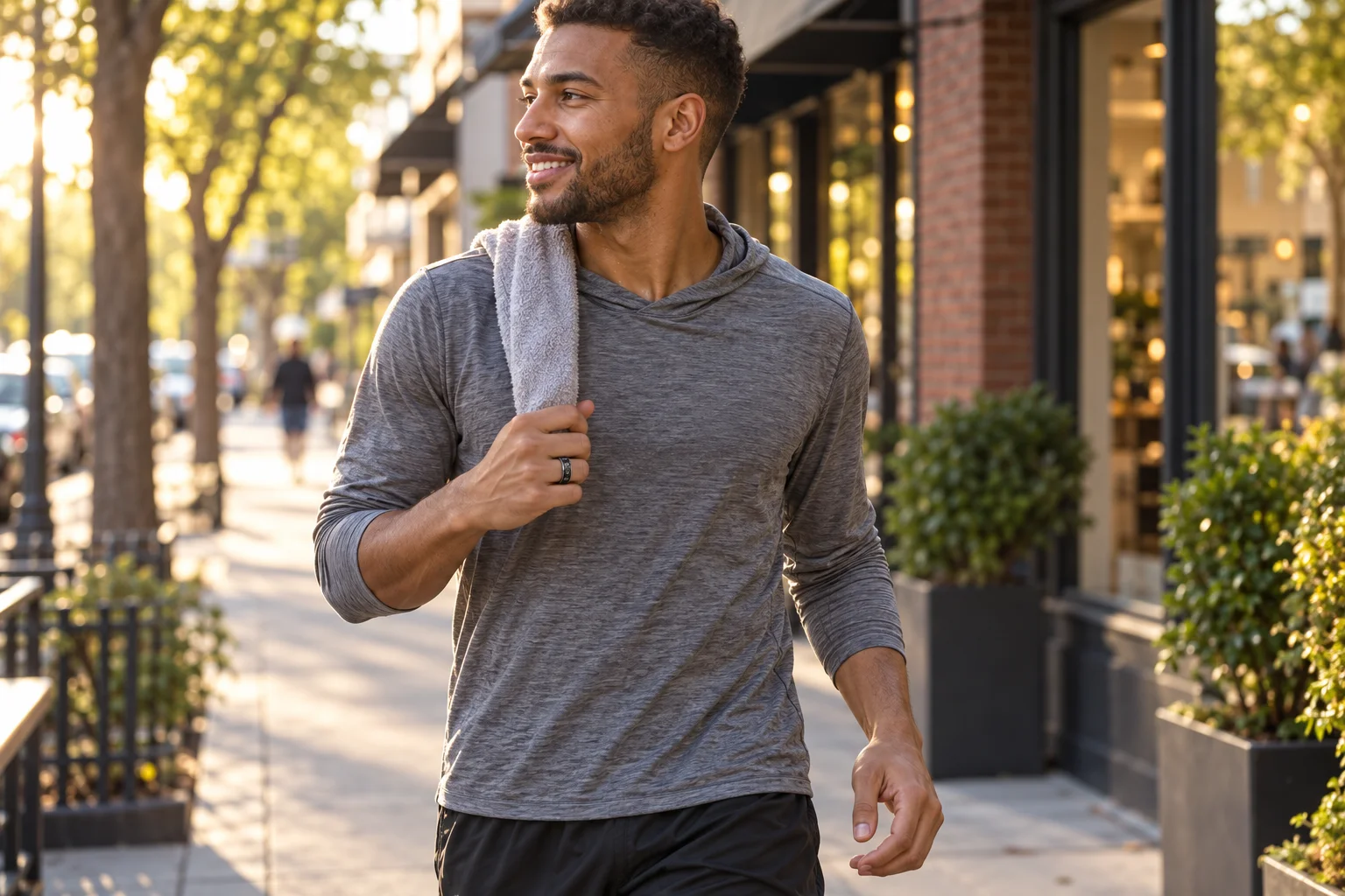 SAYDIAN R7 worn during an easy city walk after a run, showing its dark display band and lightweight ring form.